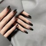 long black color with tanslucent bottom Nails design